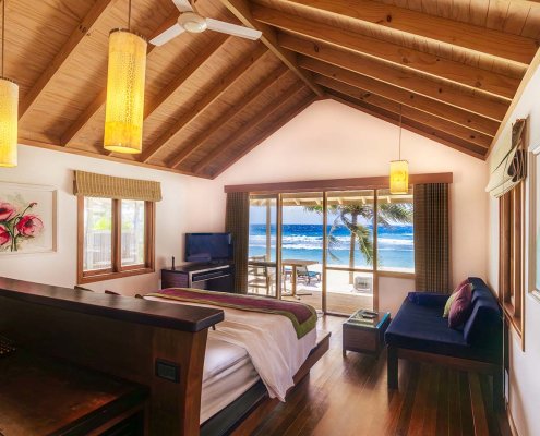 KUR_BeachVilla_2024_2 Ocean views from the beach villa bedroom at Kuredu island resort & spa in The Maldives