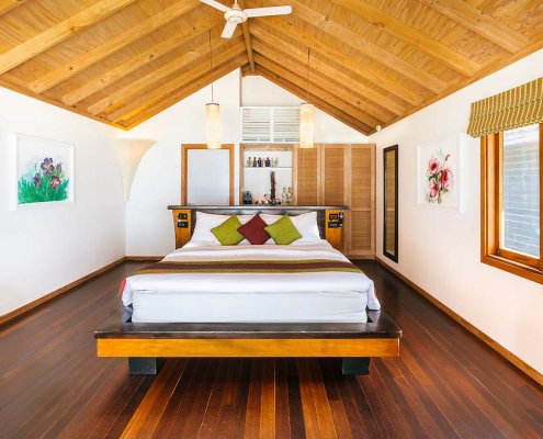 KUR_BeachVilla_2024_3 The bedroom of the garden bungalow at Kuredu in The Maldives