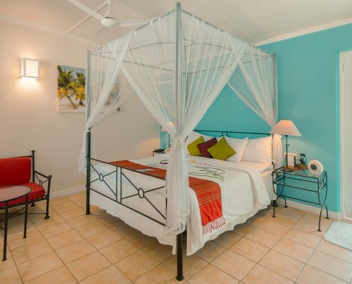 KUR_GardenBungalow_2025_3 Kuredu in The Maldives garden beach villa bedroom with four poster bed